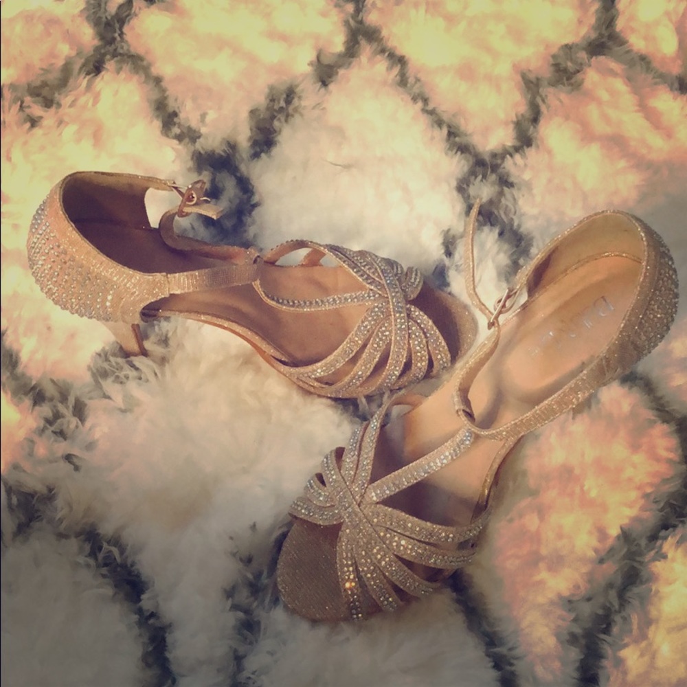 Shimmery Gold stilettos with rhinestones.